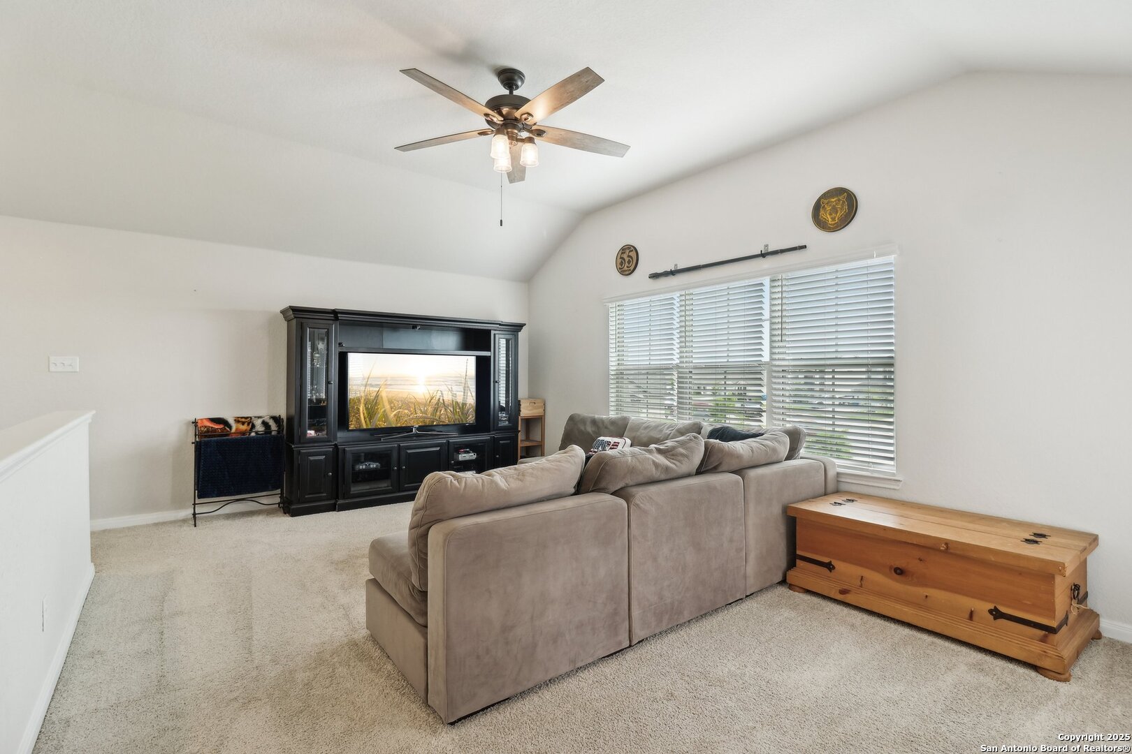 402 Devnet Cibolo, TX 78108 - Photo 16 of 32 a living room with furniture and a flat screen tv