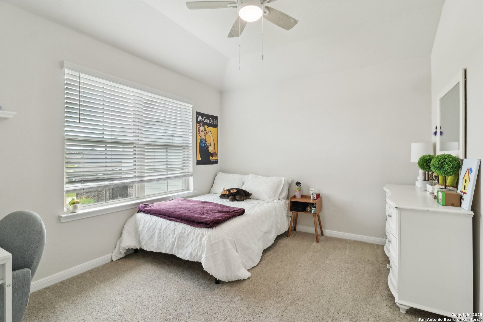 402 Devnet Cibolo, TX 78108 - Photo 17 of 32 a bedroom with a bed and a window