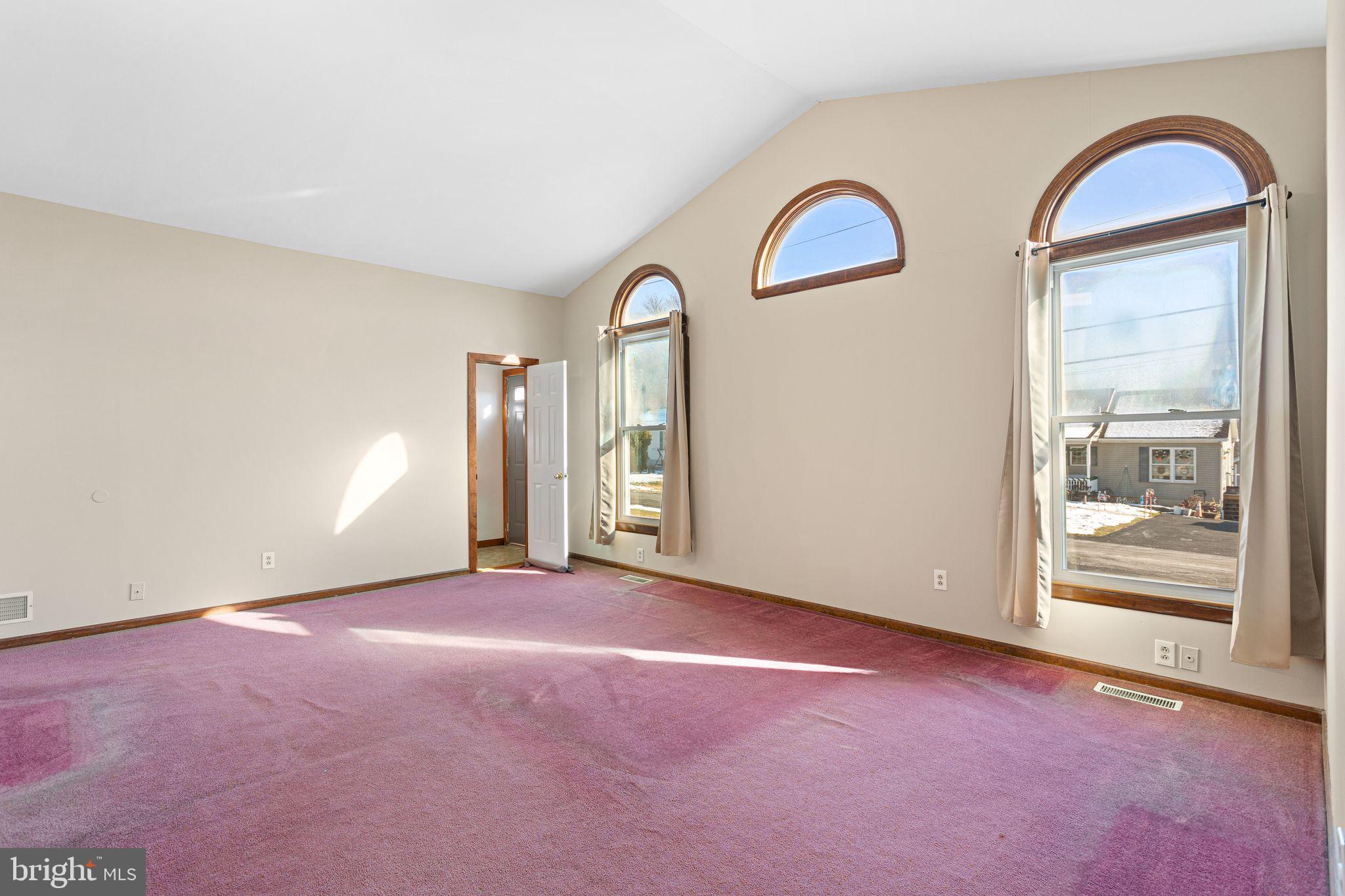 2623 Knights Road Bensalem, PA 19020 - Photo 19 of 50 an empty room with windows and mirror