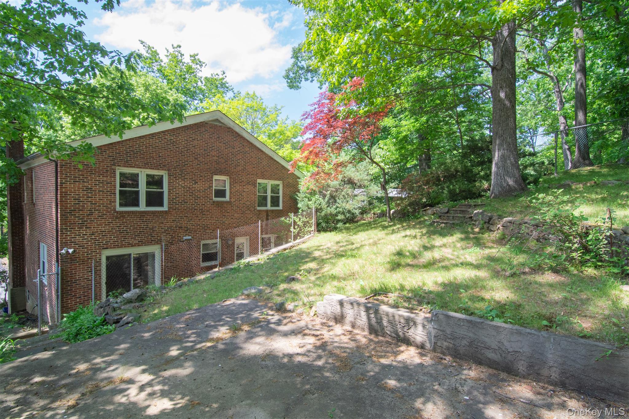 74 Briary Road Dobbs Ferry, NY 10522 - Photo 18 of 19 Fully fenced back yard convenient for pets and family.