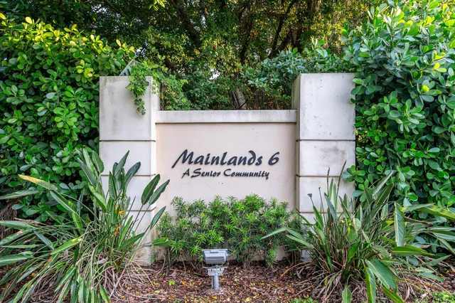 a sign on the side of the road