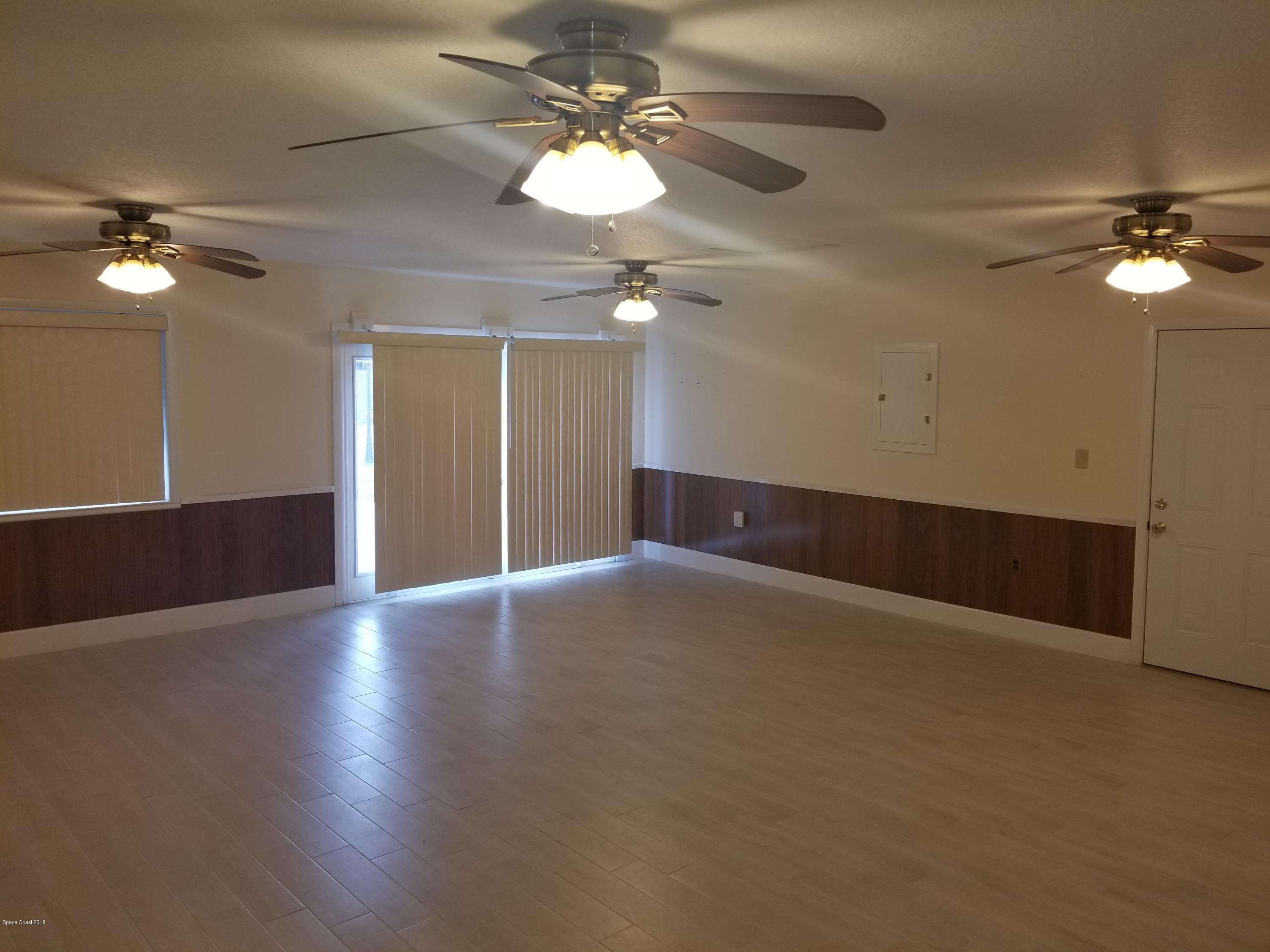 5580 Holden Road Cocoa, FL 32927 - Photo 10 of 12 Converted Living Room