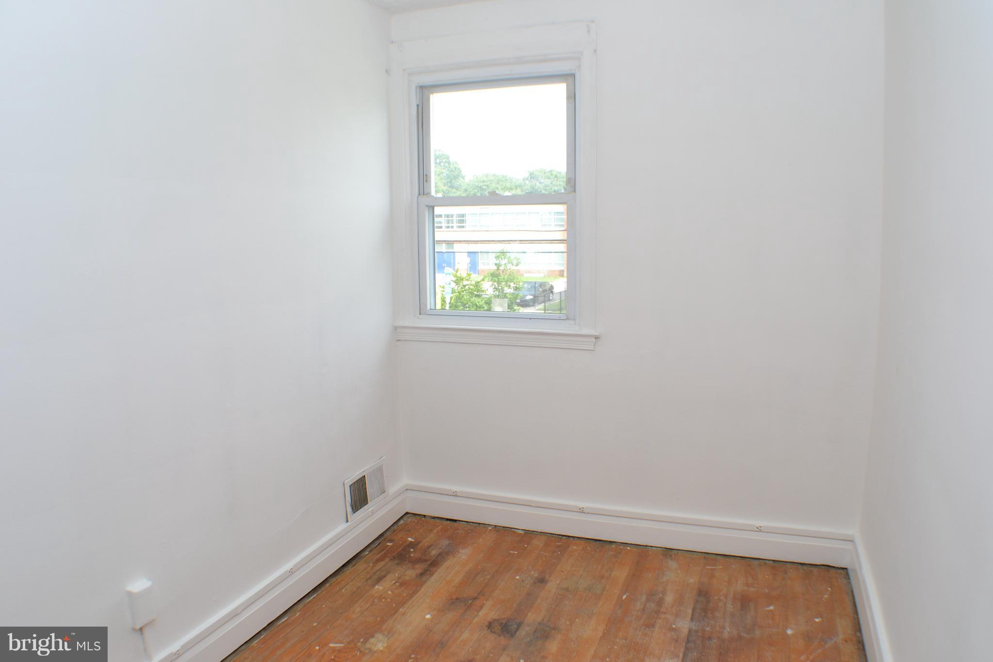 202 Kingston Road Middle River, MD 21220 - Photo 15 of 21 an empty room with a window