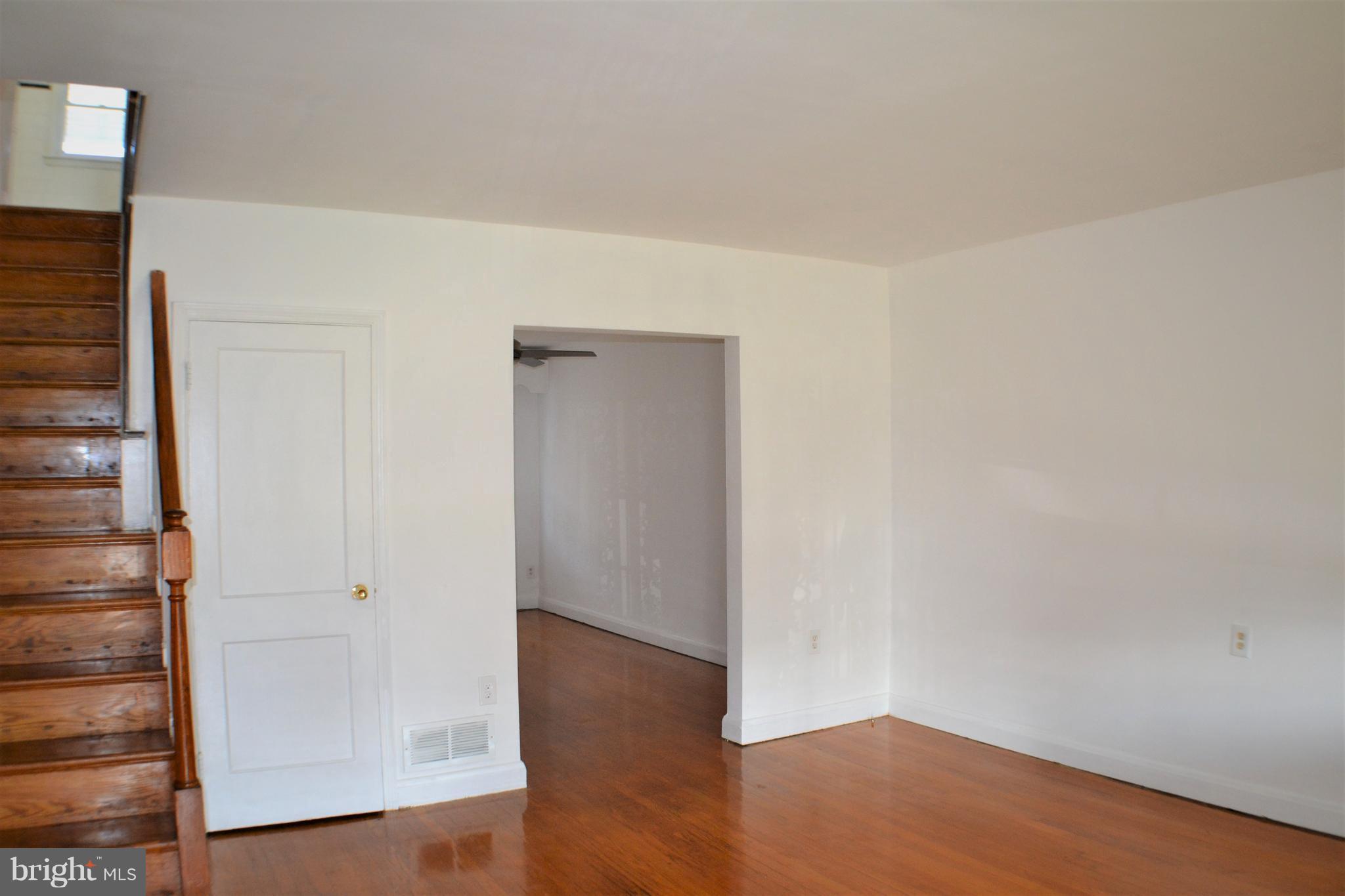 202 Kingston Road Middle River, MD 21220 - Photo 3 of 21 an empty room with wooden floor