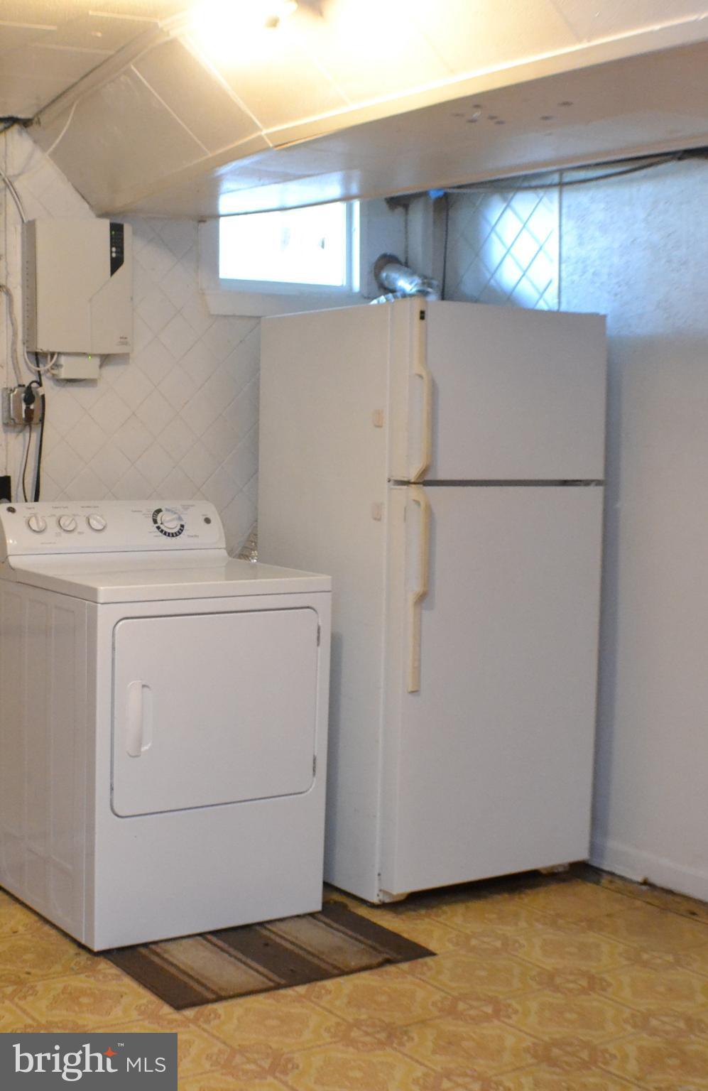 202 Kingston Road Middle River, MD 21220 - Photo 21 of 21 a utility room with dryer and washer