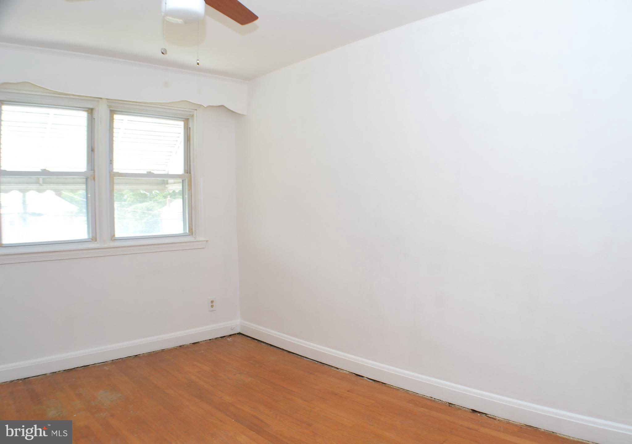 202 Kingston Road Middle River, MD 21220 - Photo 10 of 21 an empty room with a window