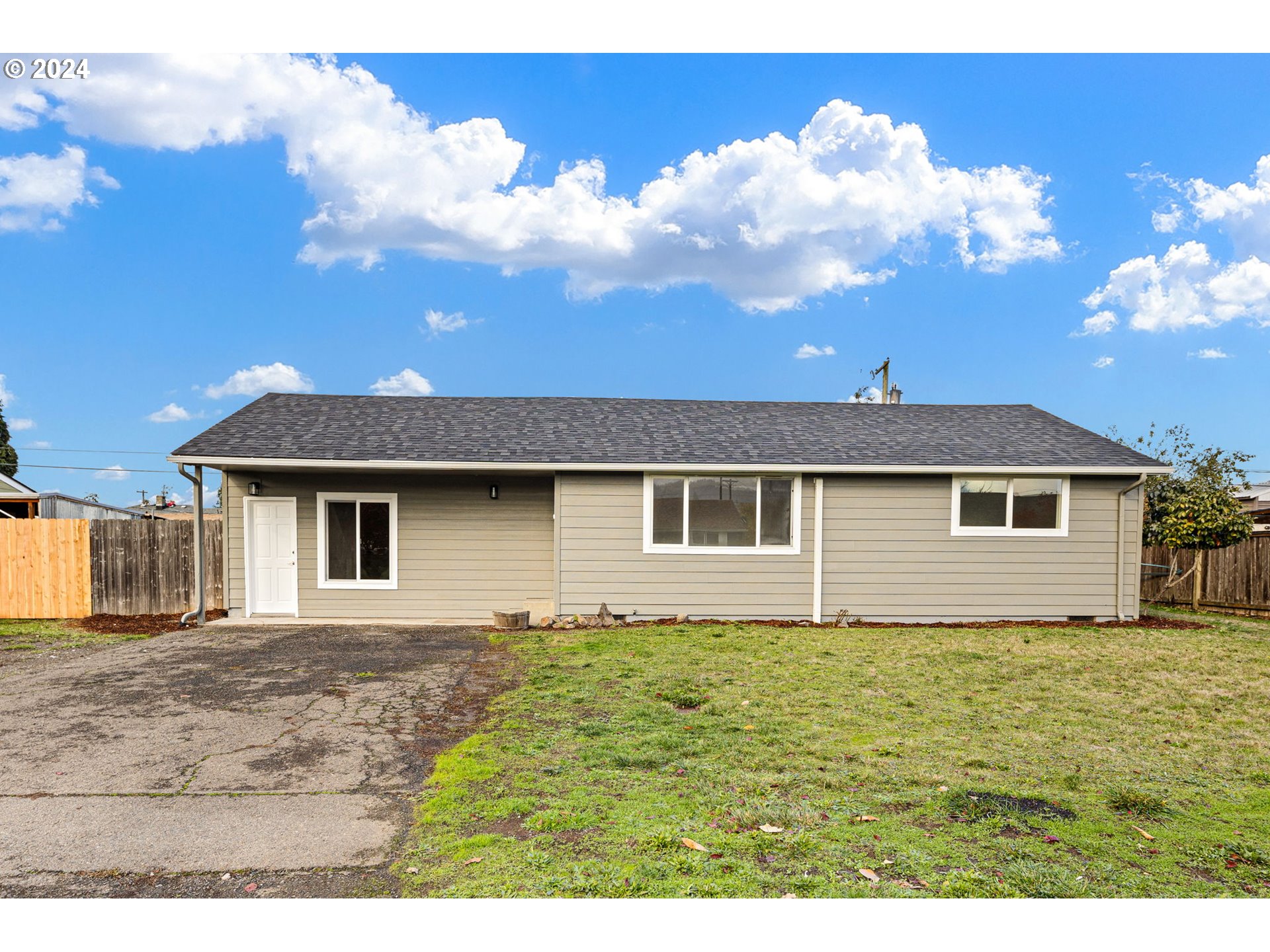 3880 South F Street Springfield, OR 97478 - Photo 1 of 42 a view of a house with a yard