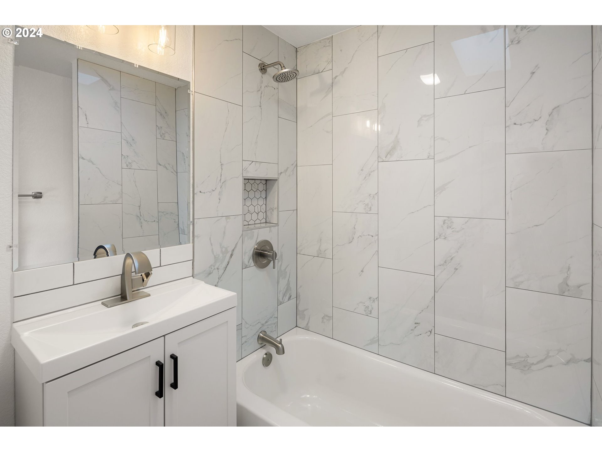 3880 South F Street Springfield, OR 97478 - Photo 16 of 42 a bathroom with a sink a toilet and shower