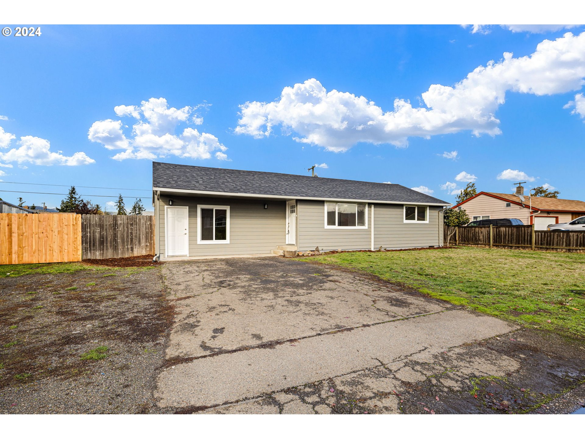 3880 South F Street Springfield, OR 97478 - Photo 2 of 42 a view of a house with a patio