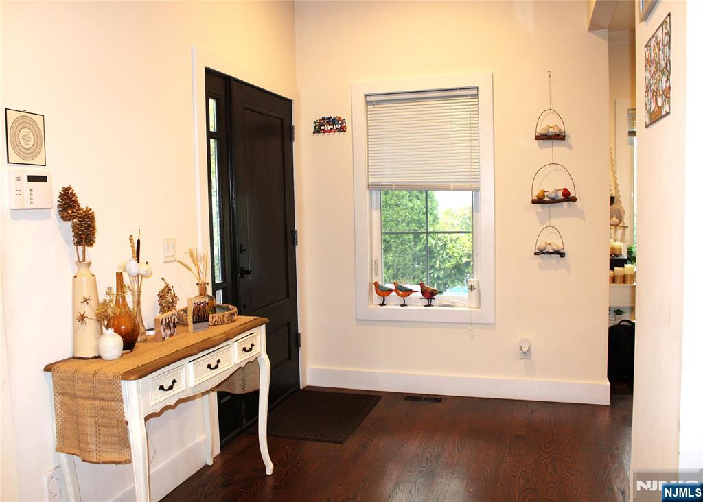 294-296 Tenafly Road Tenafly, NJ 07670 - Photo 11 of 24 a living room with furniture and a window