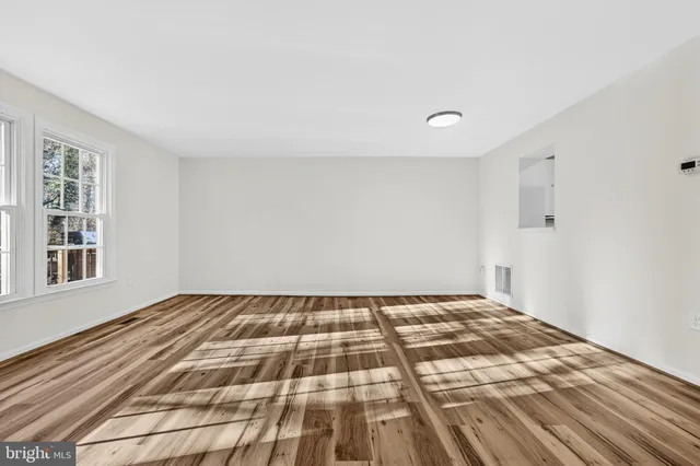 a view of a room with a front door