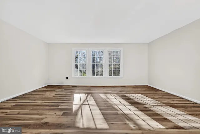 a view of a room with a window