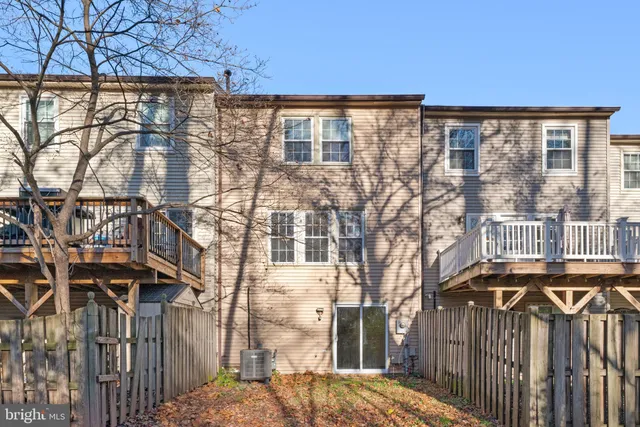 a view of a brick house with a large window