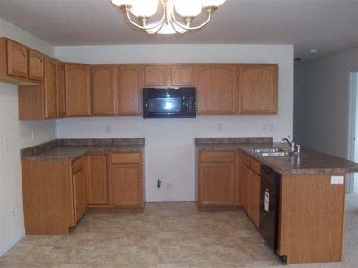 361 A South Boo Road Burns Harbor, IN 46304 - Photo 4 of 10 a kitchen with a sink and cabinets