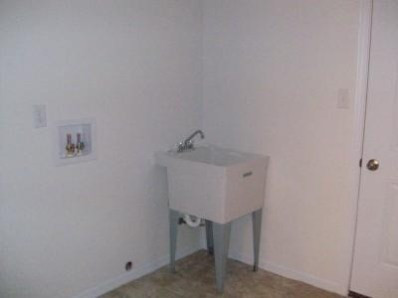 361 A South Boo Road Burns Harbor, IN 46304 - Photo 10 of 10 a bathroom with a sink and a mirror