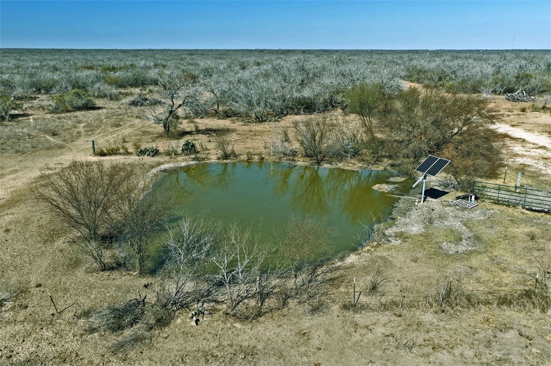2104 Cr 440 Alice, TX 78332 - Photo 7 of 23 a view of a lake with a yard