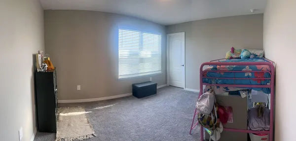 a room with window and closet