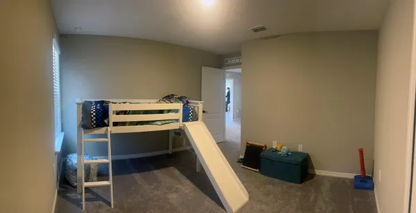 a storage room with wooden floor