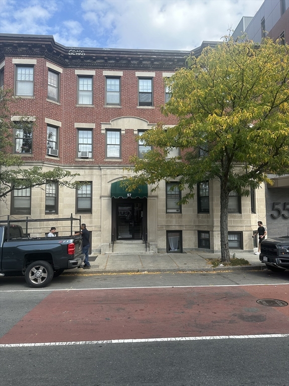 a car parked in front of a building