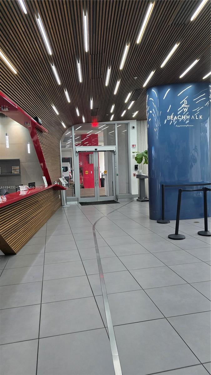 2602 East Hallandale Beach Boulevard, Unit R2508 Hallandale Beach, FL 33009 - Photo 30 of 31 a view of a room with gym equipment