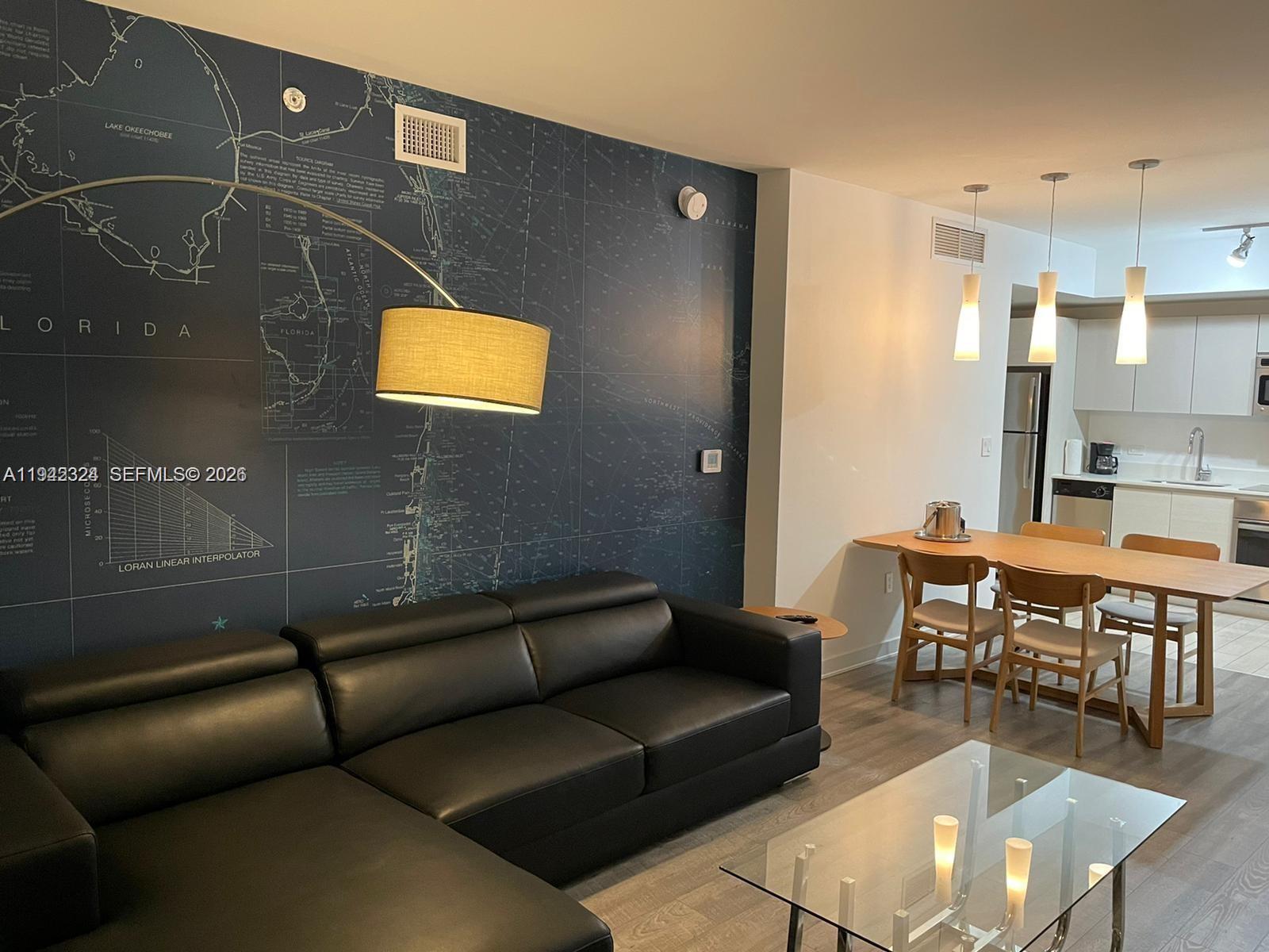 2602 East Hallandale Beach Boulevard, Unit R2508 Hallandale Beach, FL 33009 - Photo 5 of 31 a outdoor living space with furniture