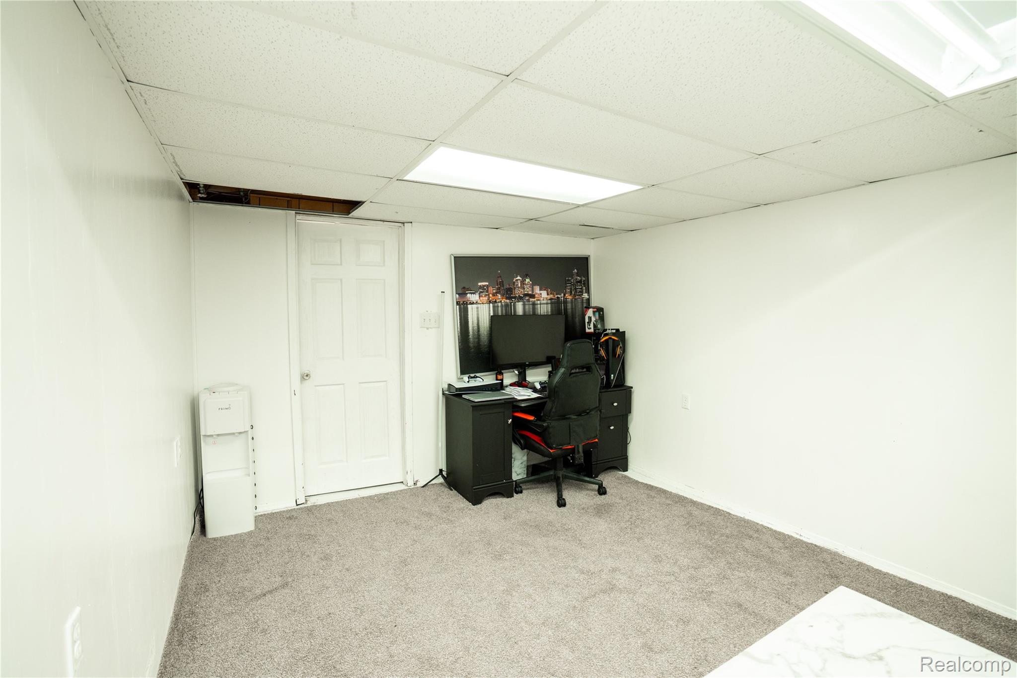 3131 Elmcrest Road Sterling Heights, MI 48310 - Photo 32 of 46 Office with light colored carpet and a drop ceiling