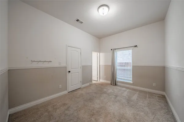 an empty room with an entryway