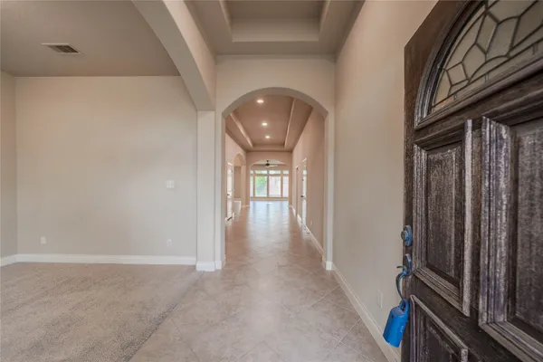 a view of a hallway with entryway