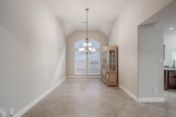 a view of a kitchen with an empty space