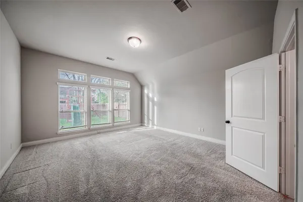 an empty room with windows