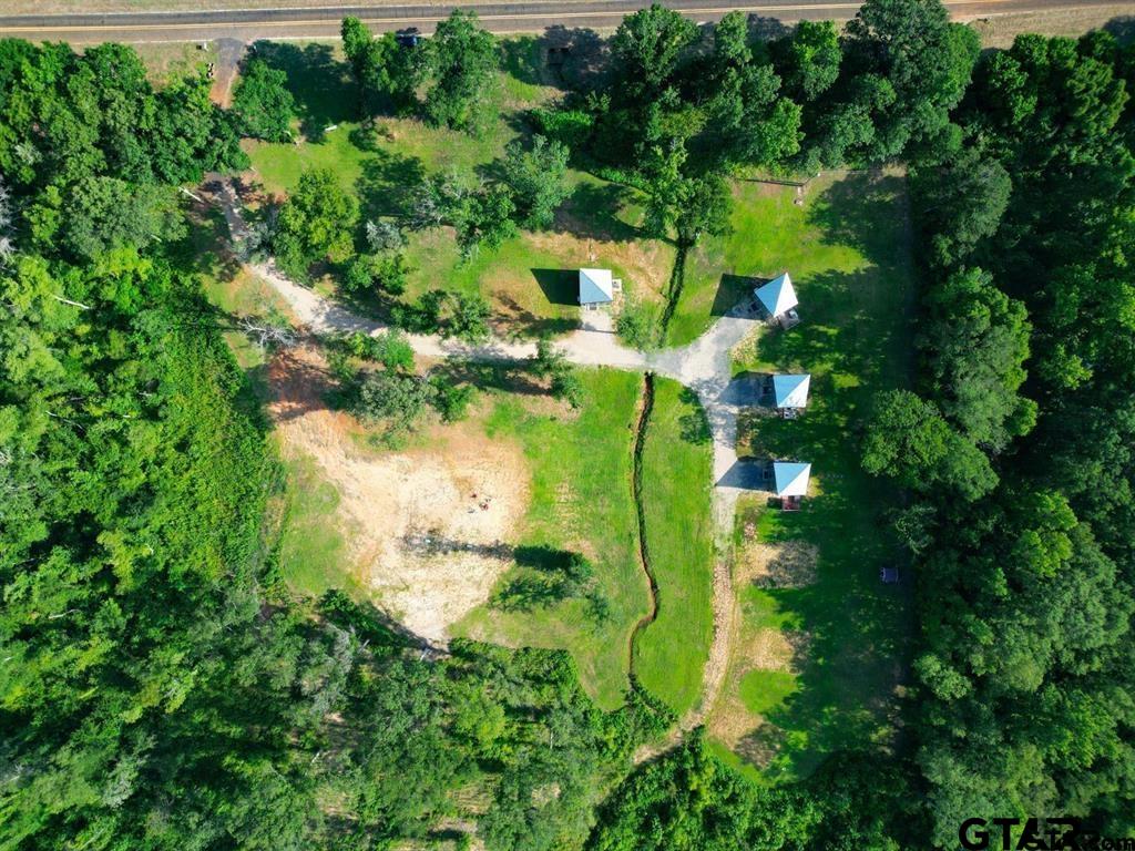 11227 Interstate 20 Tyler, TX 75708 - Photo 33 of 33 an aerial view of a house with a yard swimming pool outdoor seating and yard