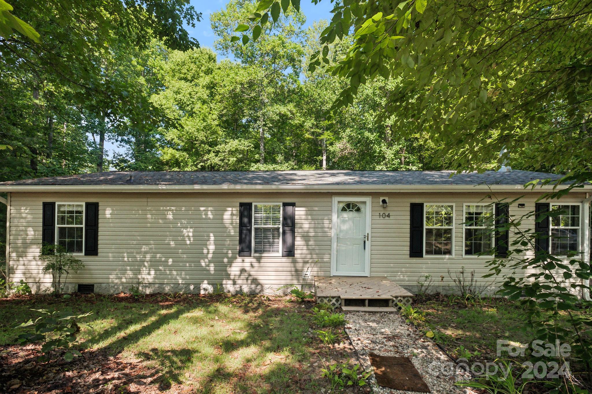 104 Cane Crest Circle Fairview, NC 28730 - Photo 1 of 29 front view of a house with a yard