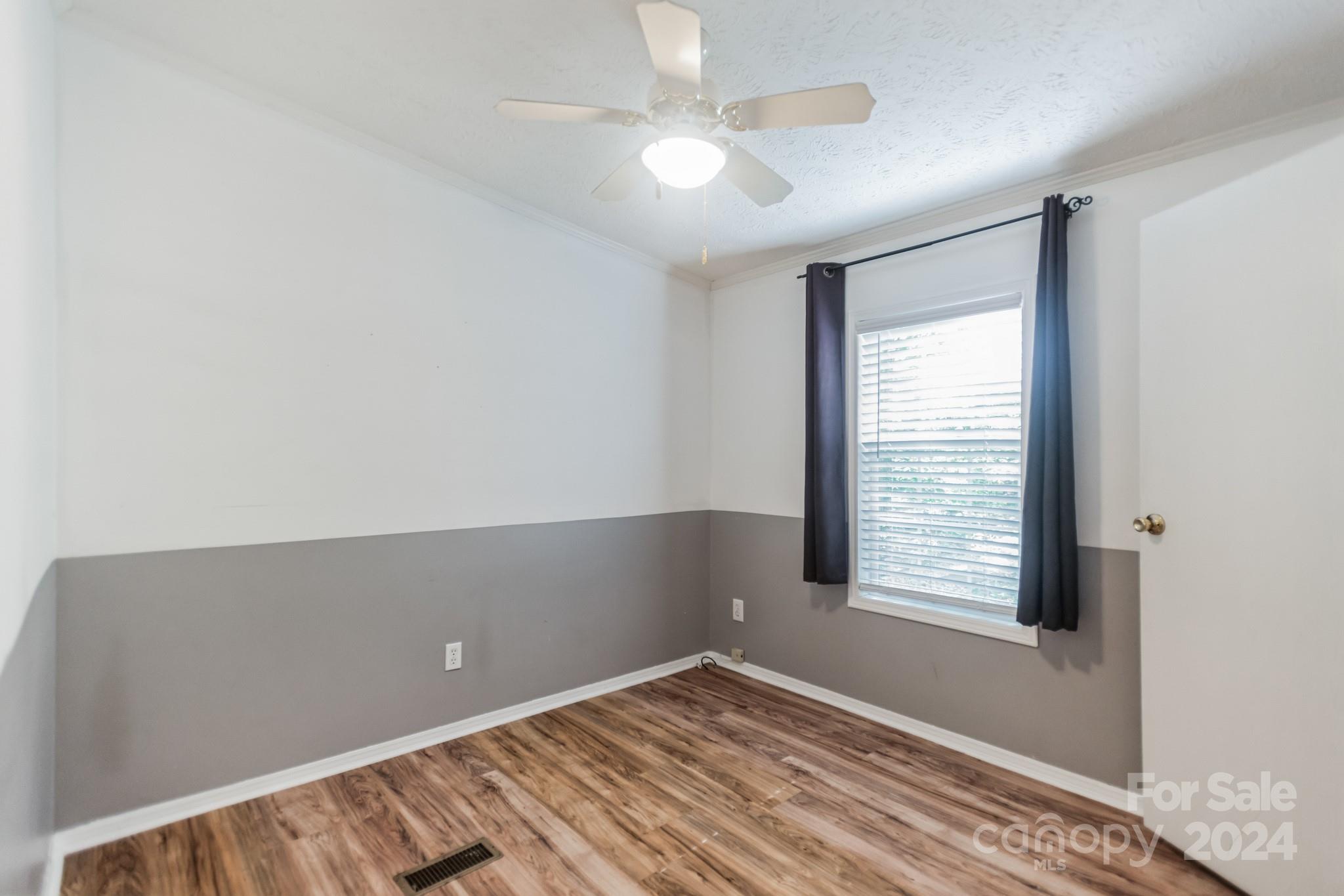 104 Cane Crest Circle Fairview, NC 28730 - Photo 14 of 29 a view of an empty room with a window