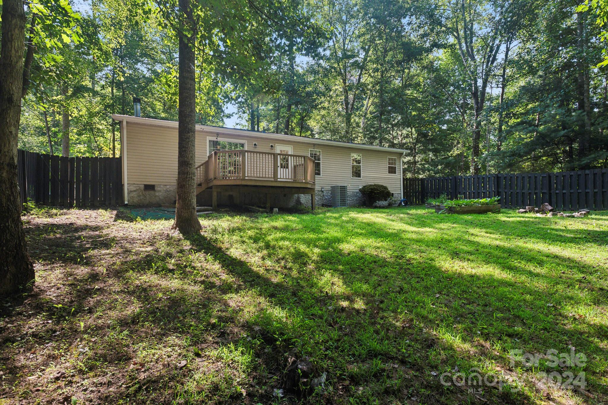 104 Cane Crest Circle Fairview, NC 28730 - Photo 19 of 29 a view of a backyard