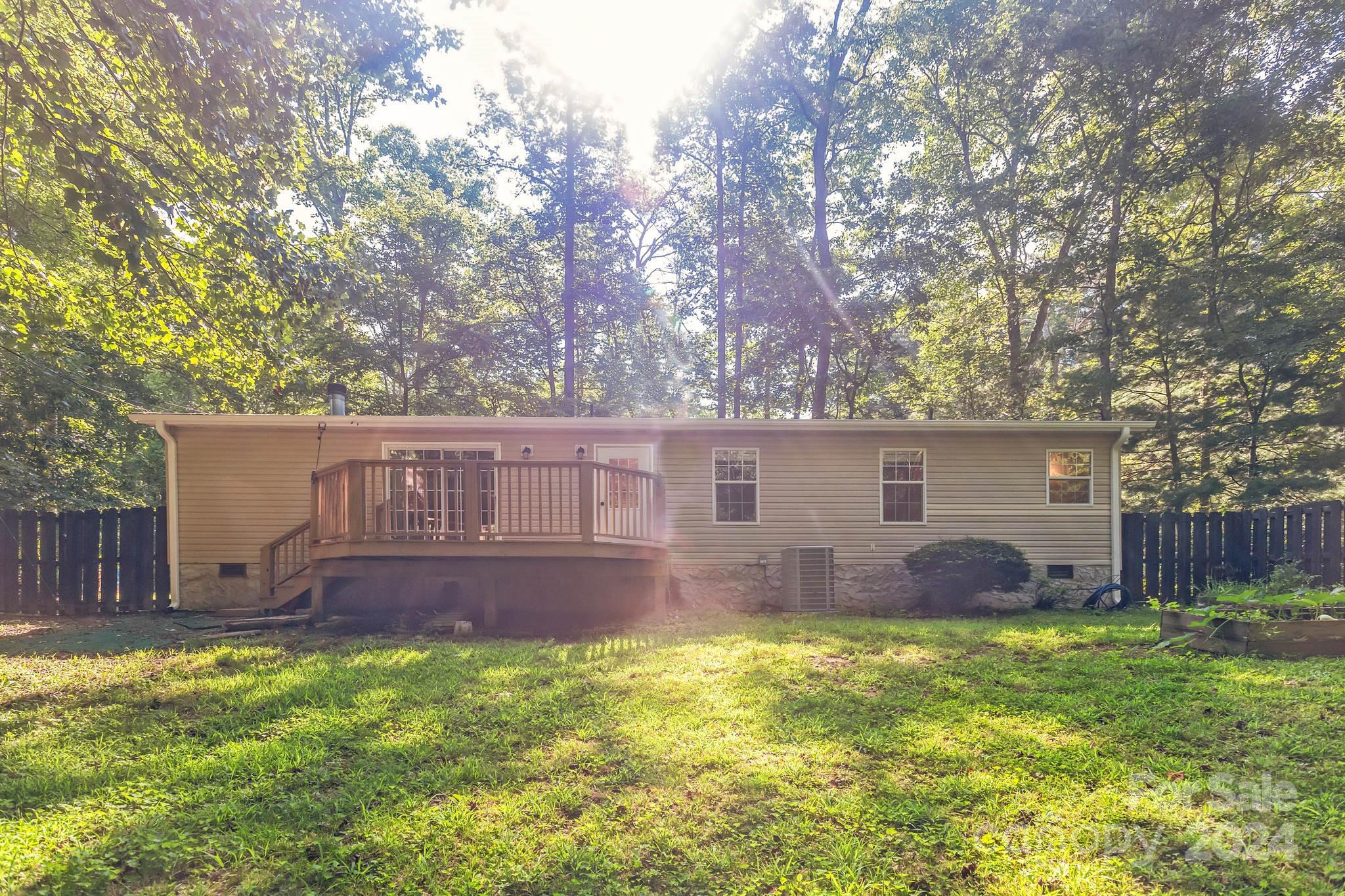 104 Cane Crest Circle Fairview, NC 28730 - Photo 20 of 29 front view of a house with a yard