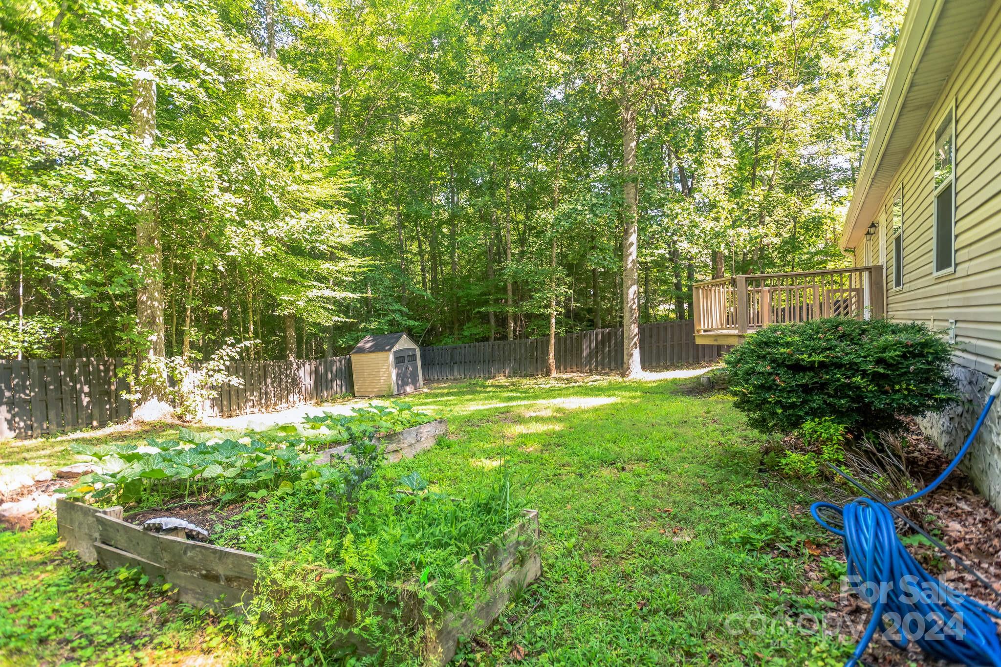 104 Cane Crest Circle Fairview, NC 28730 - Photo 23 of 29 front view of a house with a yard