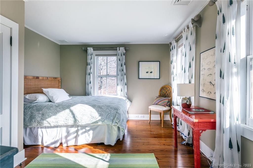 32 Leach Hollow Road Sherman, CT 06784 - Photo 19 of 40 a living room with furniture and a table