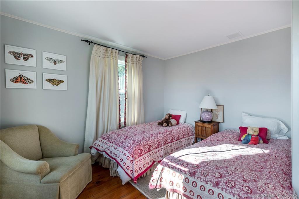 32 Leach Hollow Road Sherman, CT 06784 - Photo 21 of 40 a bedroom with two beds and painted walls