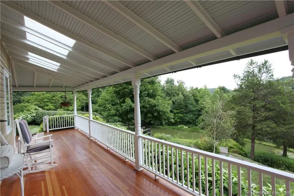 a view of balcony with chairs