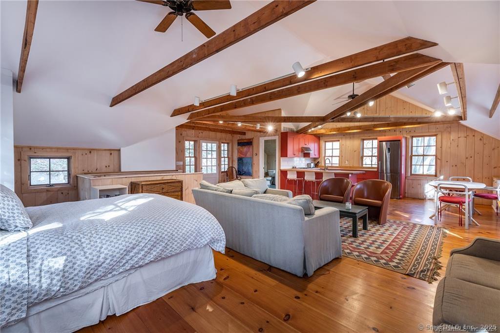 32 Leach Hollow Road Sherman, CT 06784 - Photo 27 of 40 a living room with furniture and a ceiling fan