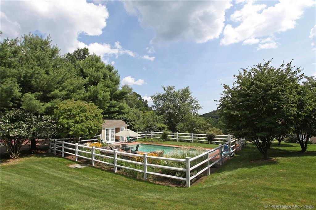 32 Leach Hollow Road Sherman, CT 06784 - Photo 30 of 40 a view of a tennis ground with large trees