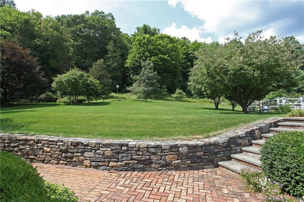 32 Leach Hollow Road Sherman, CT 06784 - Photo 32 of 40 a view of a park with large trees