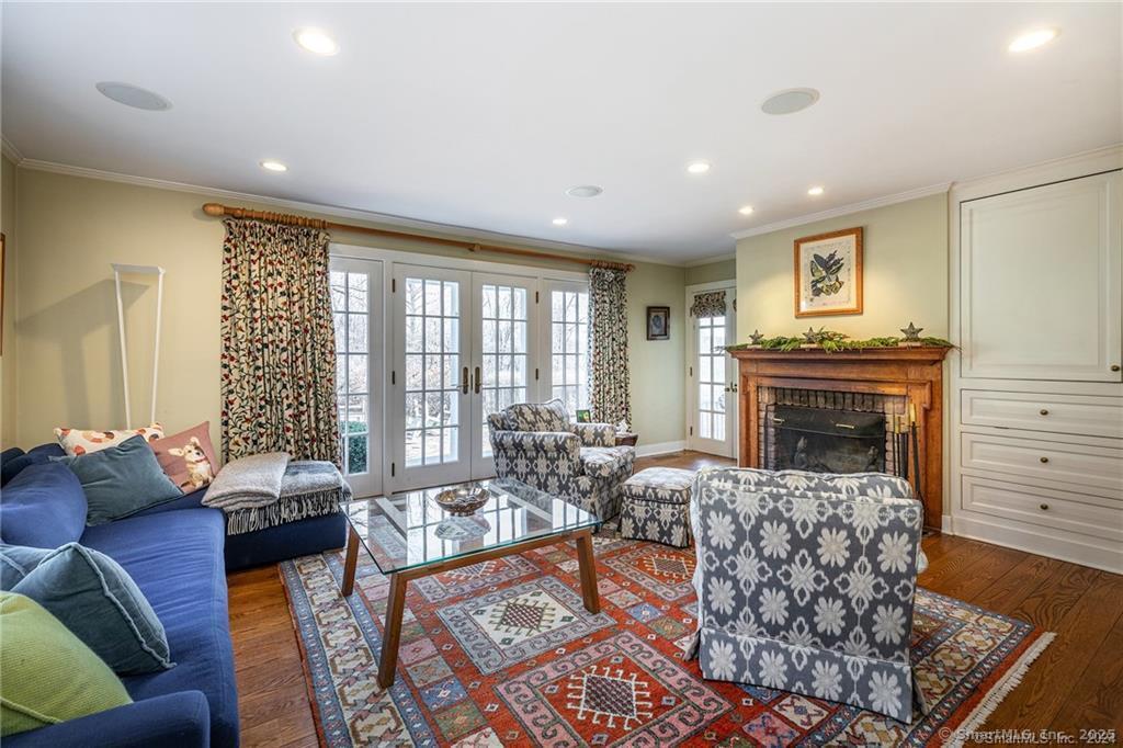 32 Leach Hollow Road Sherman, CT 06784 - Photo 8 of 40 a living room with furniture and a fireplace