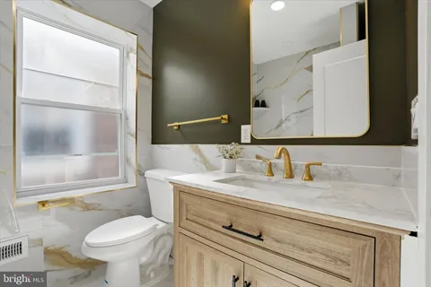 a view of a hallway with washer and dryer
