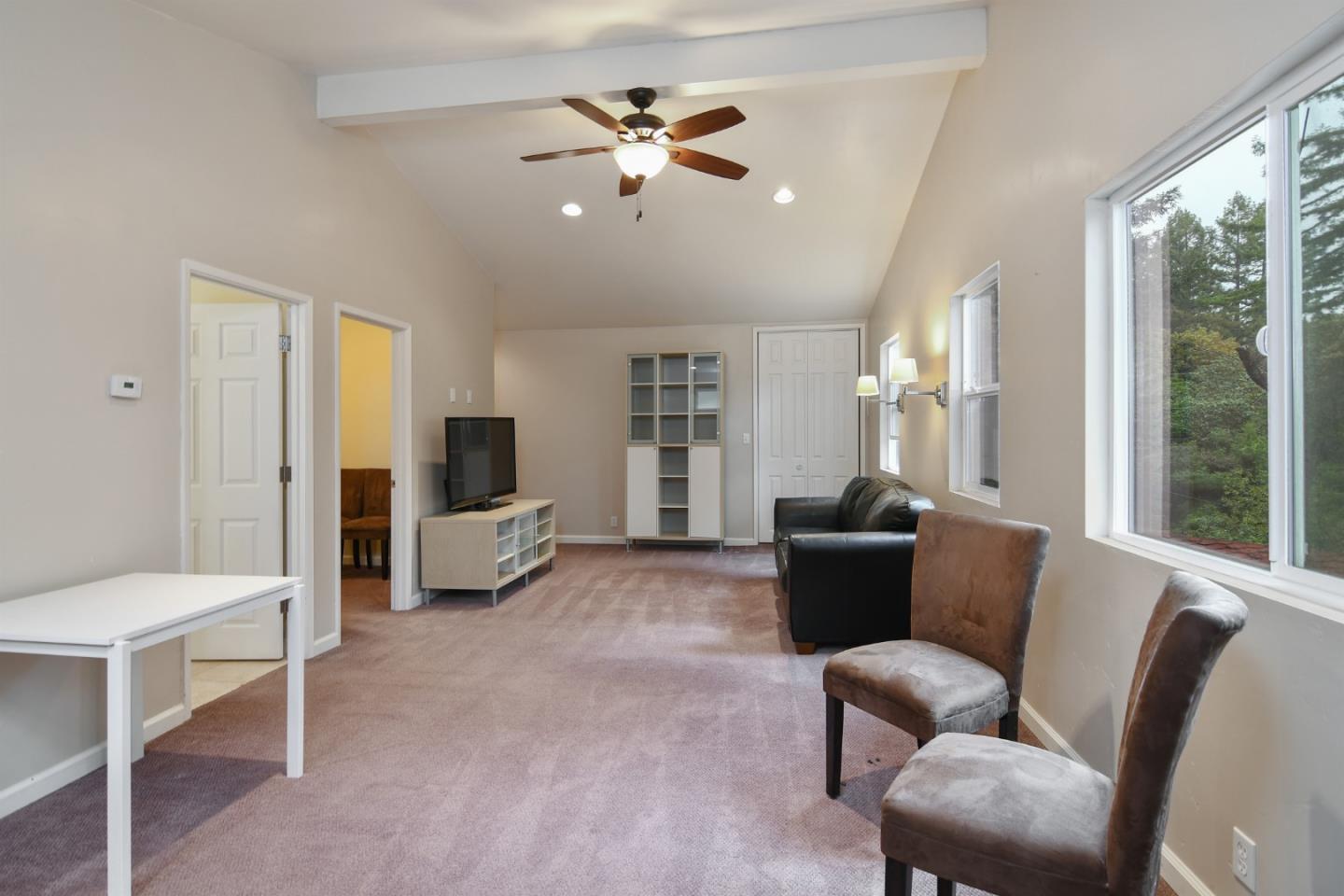 144 Eagle Crest Drive Scotts Valley, CA 95066 - Photo 14 of 28 a living room with furniture and a large window