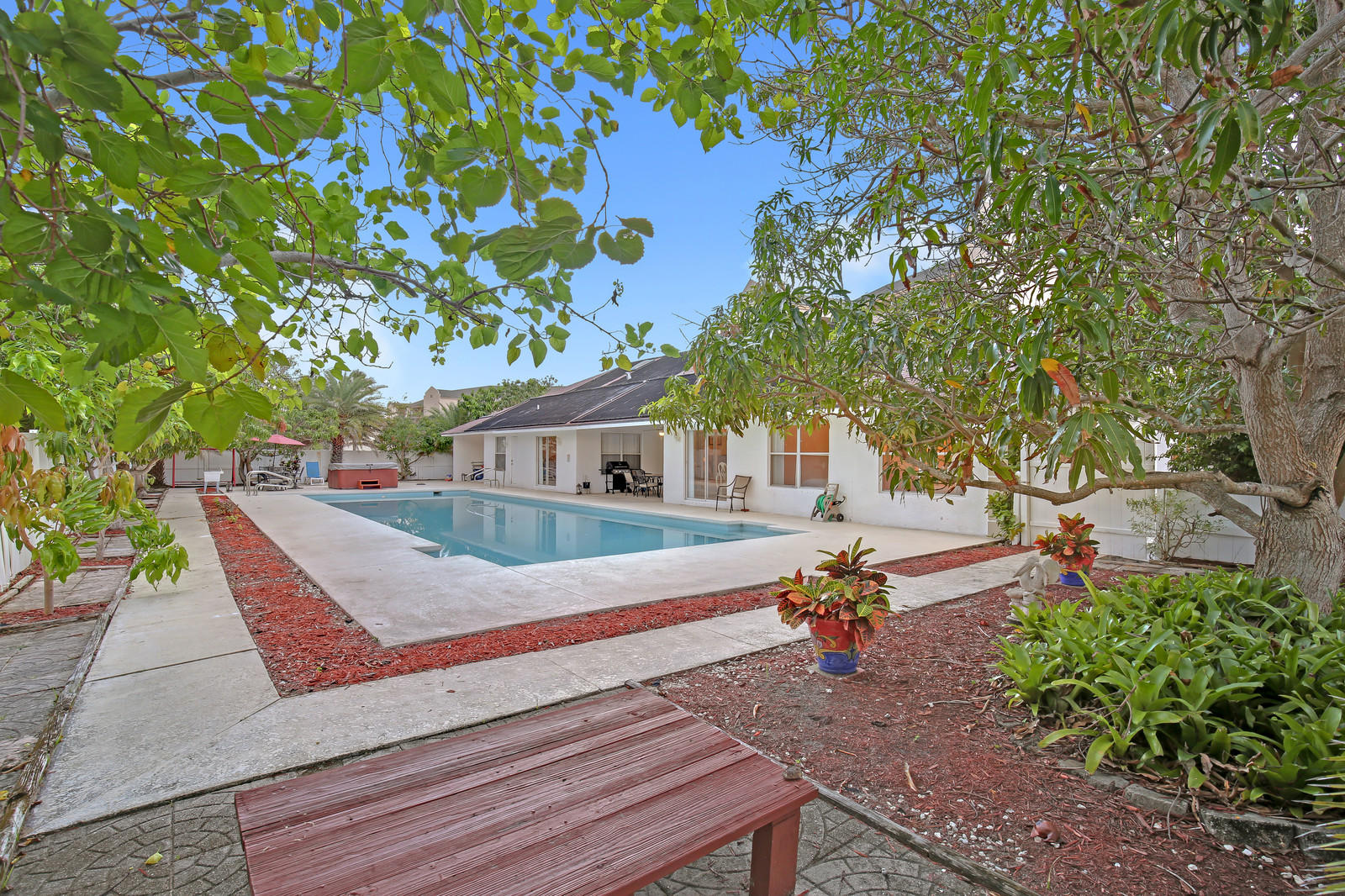 299 Palm Avenue Jupiter, FL 33477 - Photo 19 of 26 a view of a house with backyard