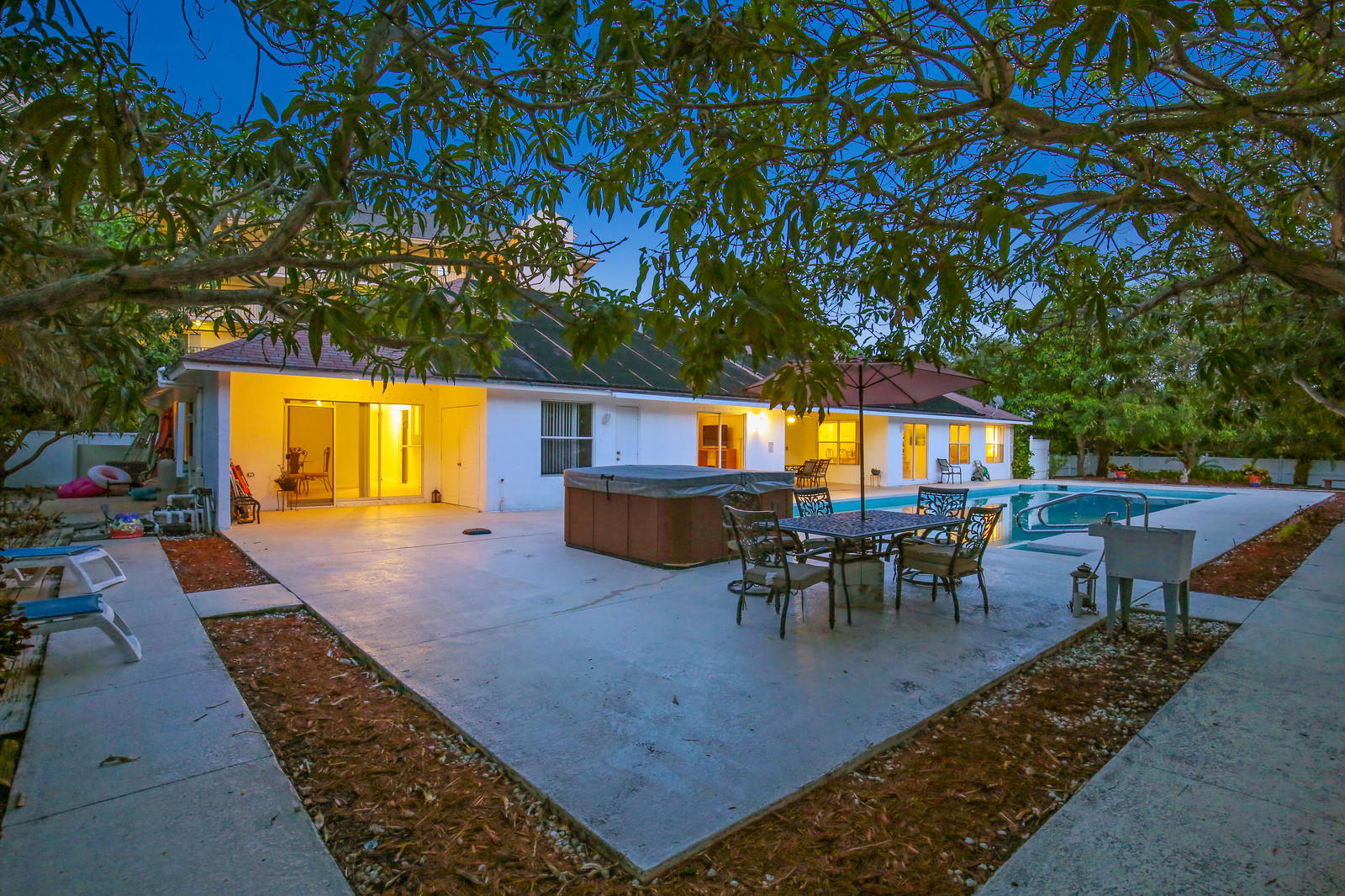 299 Palm Avenue Jupiter, FL 33477 - Photo 22 of 26 swimming pool view with a seating space