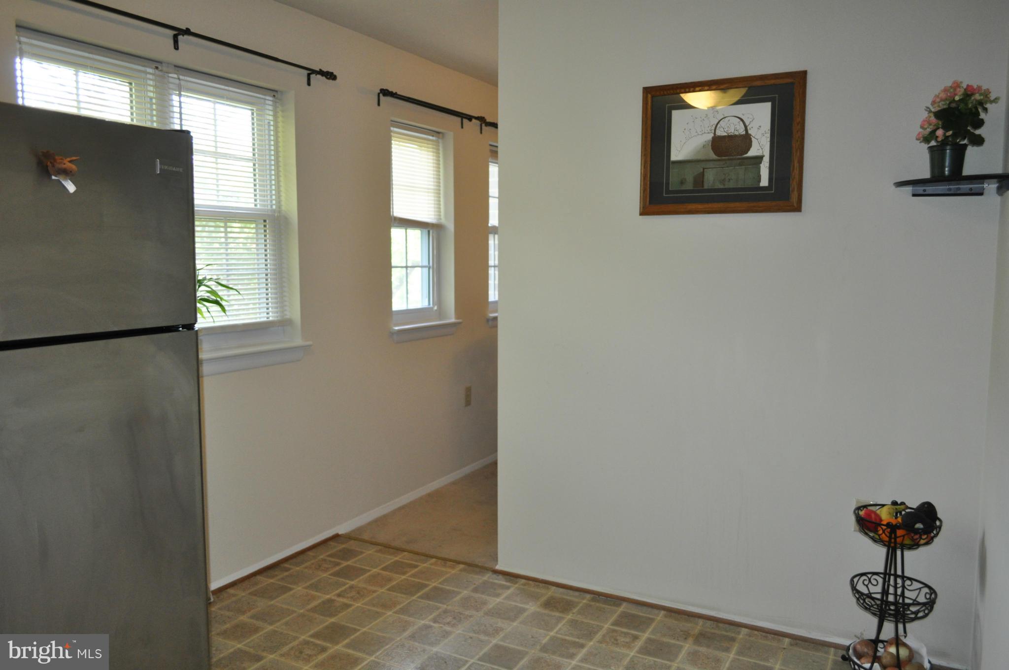 8020 Sandy Spring Road Laurel, MD 20707 - Photo 7 of 30 Kitchen to Dining Room