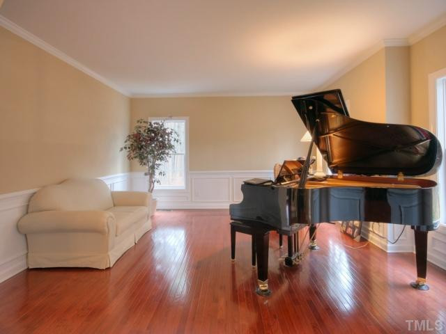 3 Highcross Court Raleigh, NC 27613 - Photo 5 of 25 This living room could be used as a mutli purpose room. The stunning oak flooring completes the first floor. Ample natural lighting is bright & airy! Living Room