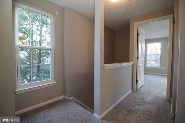 an empty room that has a window